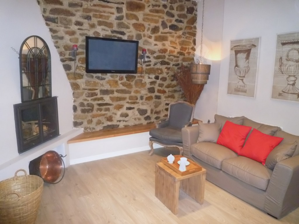 Imagen de la Sala de estar y la chimenea en el Hotel Rural El encanto del Moncayo